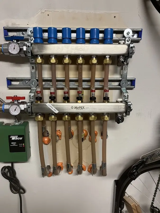 Plumber performing Water Heater Repair at a residential property in Appleton